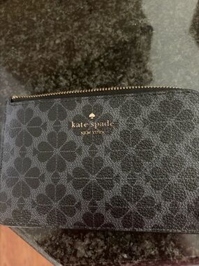 kate spade metallic charcoal wristlet clutch with gold logo